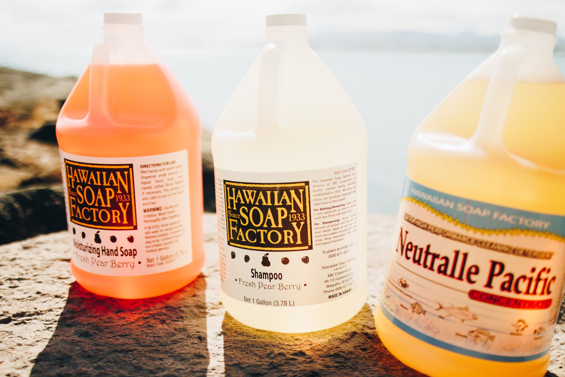 Hawaiian Soap Factory hand soap, shampoo, and Neutralle Pacific gallons by the ocean